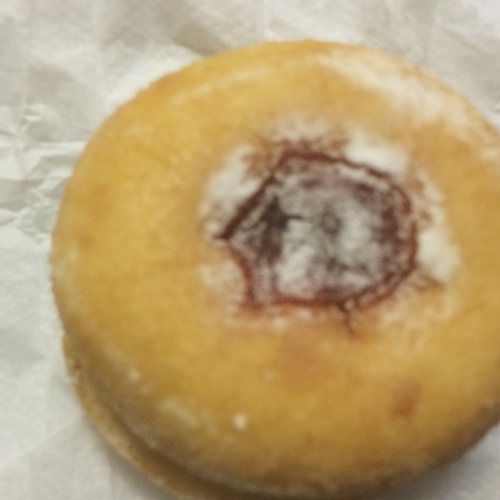 A sugared jam doughnut.