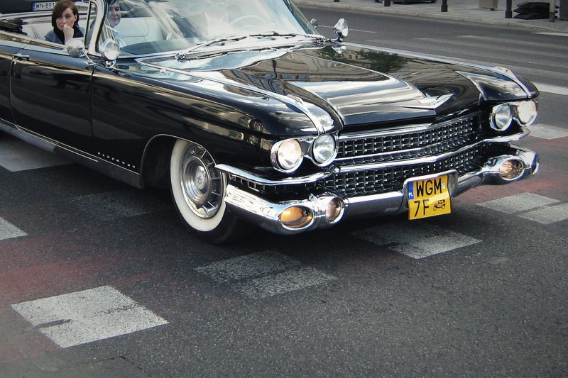 A black 1959 Cadillac Eldorado Biarritz convertible photographed on a city street.