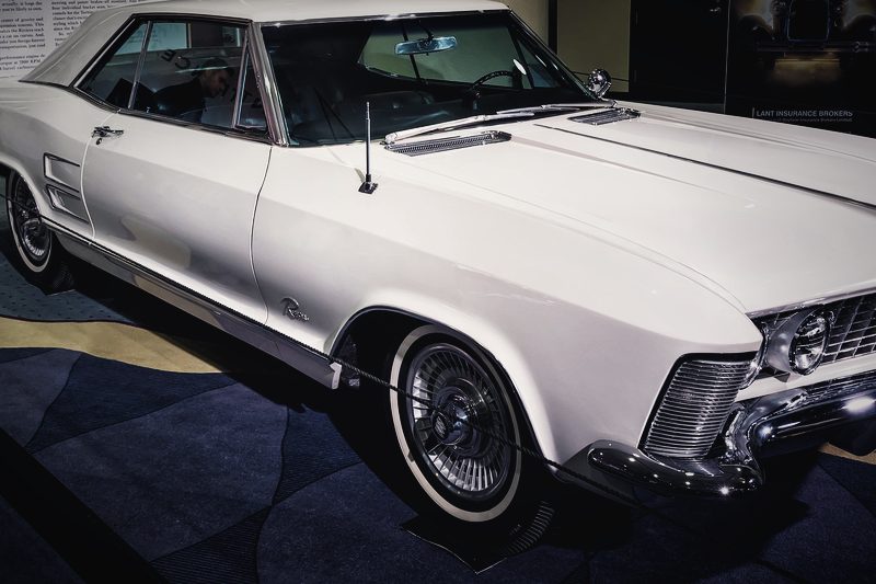 A white 1963 Buick Riviera photographed from the front three-quarter.